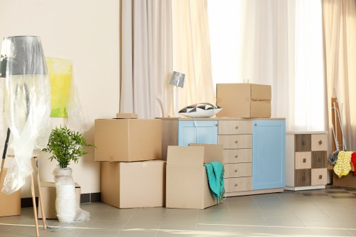 Removal team loading furniture for a same day move in Hounslow