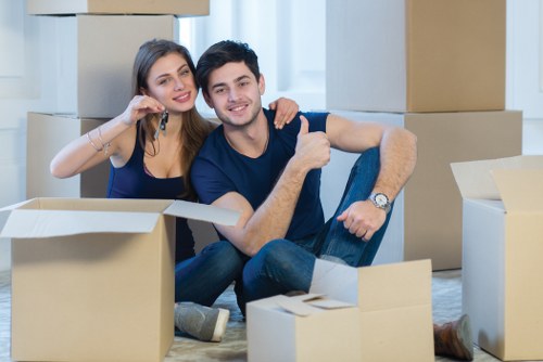 Removal team planning a house move in Hounslow with boxes and furniture