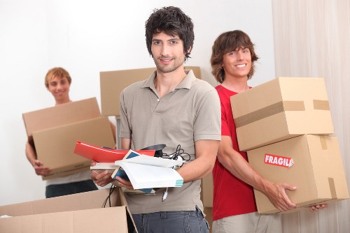 Student removals team loading boxes in Hounslow