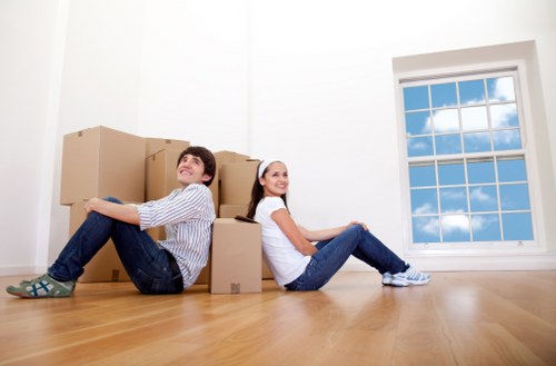 Loading furniture and boxes into a hire truck for a West London move