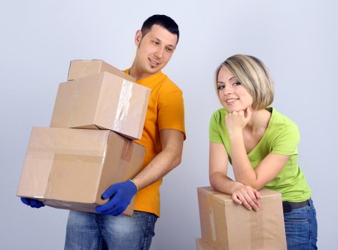 Office furniture relocation with desks, chairs, and storage units