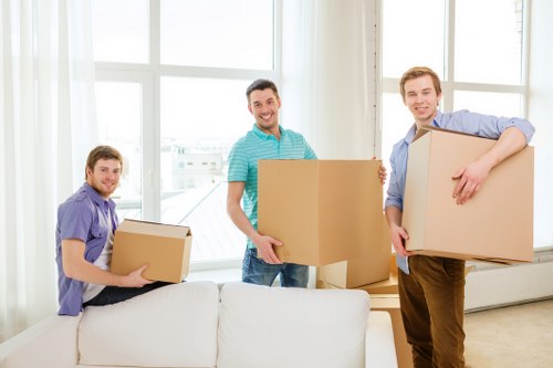Careful loading of sofas and large household furniture into a removal van
