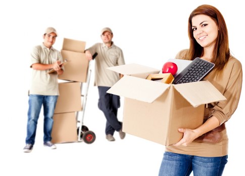 Supervisor reviewing safety measures before unloading a removal van